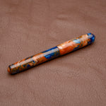 Load image into Gallery viewer, Fountain Pen - Bock #6 - 13 mm - In-house cast with multiple tones of blue, orange-brown and white.
