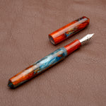 Load image into Gallery viewer, Fountain Pen - Bock #6 - 13 mm - In-house orange and light blue with fireopal glitters in the orange
