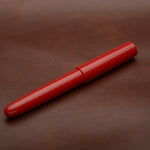 Load image into Gallery viewer, Fountain Pen - Bock #6 - 13 mm - Red acrylic with polyester section and brass detail ring
